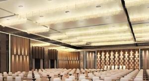 a large room with rows of chairs in it at Best Western Tianjin Juchuan Hotel in Binhai