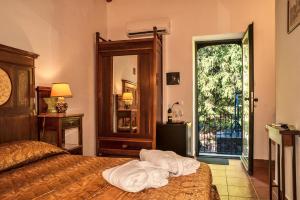 Posteľ alebo postele v izbe v ubytovaní Casale Poggio del Tiglio + 36 fotografií