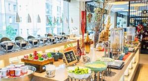a buffet line with many different food items on it at Wuhan Soluxe Hotel in Wuhan