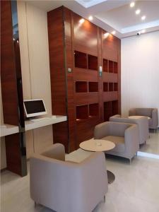 TV a/nebo společenská místnost v ubytování City Comfort Inn Zhongshan Dongsheng One Plus One