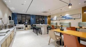 Kuchyň nebo kuchyňský kout v ubytování City Comfort Inn Laibin Tongmu