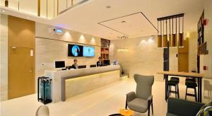 Televisyen dan/atau pusat hiburan di City Comfort Inn Kunming High-speed Railway South Station 7th Street Area