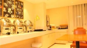 Kuchyň nebo kuchyňský kout v ubytování City Comfort Inn Ji'an County Junshan Avenue