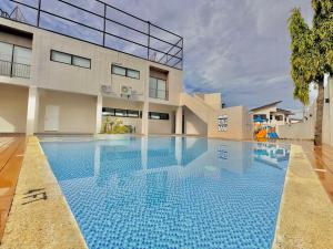 Bazén v ubytování Luxe Bed Free Wi-Fi Netflix Pool Gym Near Airport and Mactan Newtown nebo v jeho okolí