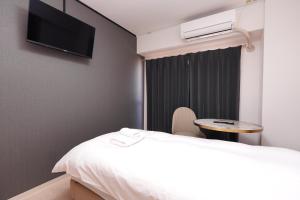 Μια τηλεόραση ή/και κέντρο ψυχαγωγίας στο システムコ-ト戎本町