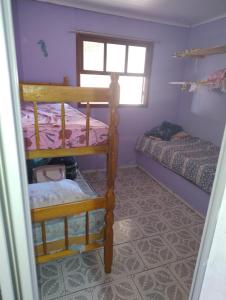 Katil atau katil-katil dalam bilik di Casa Cidreira 2 quartos Costa Sol - Acomoda até 8 pessoas- Aceito Pets