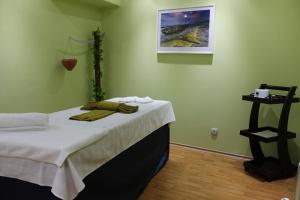 Postel nebo postele na pokoji v ubytování Hotel Arena