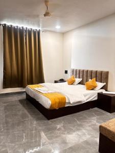 Postel nebo postele na pokoji v ubytování inshu international