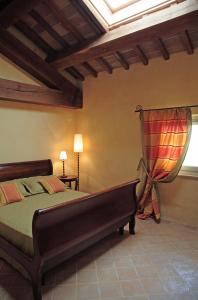 a bedroom with a bed and a window at Canonica di Corteranzo in Murisengo +33 photos