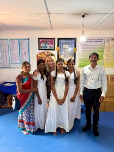 a group of people posing for a picture in a classroom at 108 Palms Beach Resort in Trincomalee +209 photos