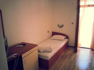 A bed or beds in a room at Villa Diana Self check-in