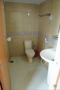 Koupelna v ubytování Water Paradise Resort + 26 fotografií