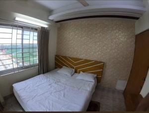 Postel nebo postele na pokoji v ubytování Water Paradise Resort