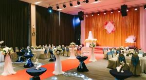 a banquet hall with white and blue tables and chairs at Neca Reiche in Hat Yai +148 photos