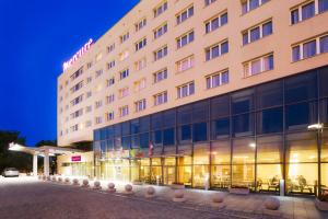 a rendering of a hotel at night at Hotel Mercure Toruń Centrum in Toruń