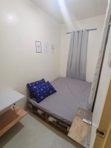 Postel nebo postele na pokoji v ubytování Dims Hostel