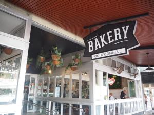 ein Bäckereischild an der Vorderseite eines Gebäudes in der Unterkunft The Arches- Boutique 3-Bedroom Stay Near Adelaide Oval, City and Amazing Dining in North Adelaide