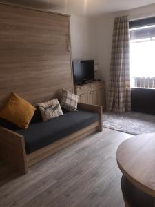 Et tv og/eller underholdning på Bear Hutte Saalbach near Billa