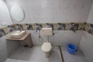 Koupelna v ubytování Hotel Bhakti Dhama