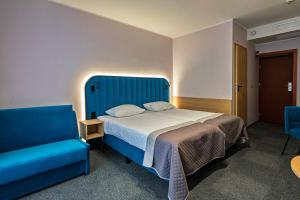 Ένα ή περισσότερα κρεβάτια σε δωμάτιο στο Hotel Pietrak +64 φωτογραφίες