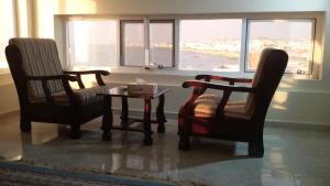 Predel za sedenje v nastanitvi Serapis Hotel