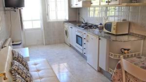 Køkken eller tekøkken på Apartamento con balcón al lado de la iglesia