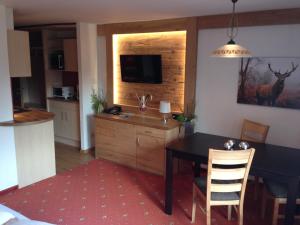 A kitchen or kitchenette at Sonnleiten - Guggerhof - Villa Sonnenwies