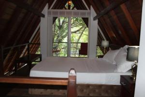 Postel nebo postele na pokoji v ubytování Tepraas Matale