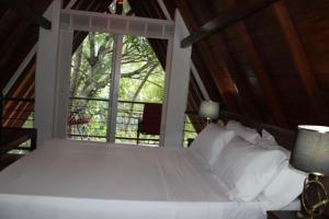 Postel nebo postele na pokoji v ubytování Tepraas Matale