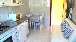 Køkken eller tekøkken på Apartamento con balcón al lado de la iglesia