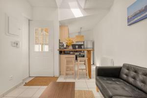 Kuchyň nebo kuchyňský kout v ubytování Havre de paix avec terrasse privé à Toulouse