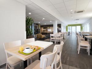 Restaurace v ubytování B&B HOTEL Lyon Sud États-Unis