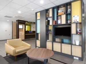 Posezení v ubytování B&B HOTEL Lyon Sud États-Unis