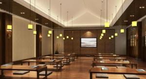 a large room with wooden tables and a screen at Grand House Chongqing Dazu Rock Carvings in Dazu