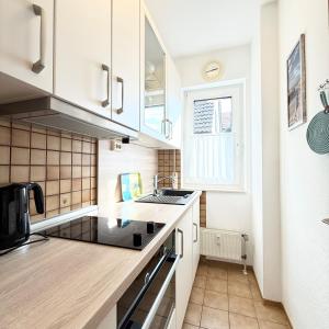 Dapur atau dapur kecil di Voßhörn 3 Wohnung 2