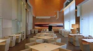 a dining room with tables and white chairs at Jinjiang Inn Select Shanghai Fengxian Baolong Square North Yunhe Road in Shanghai +138 photos
