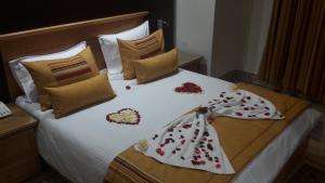Ένα ή περισσότερα κρεβάτια σε δωμάτιο στο Hotel Julius