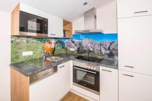 Cucina o angolo cottura di Appartements AUSZEIT with private SPA