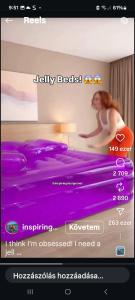 a screenshot of a website with a monkey on a bed at Ánizs Apartmanház in Makó +4 photos