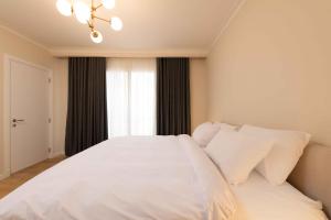 Postel nebo postele na pokoji v ubytování 1BDRM at Pyramids Hills