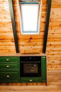 Μια τηλεόραση ή/και κέντρο ψυχαγωγίας στο Peaceful Cabin