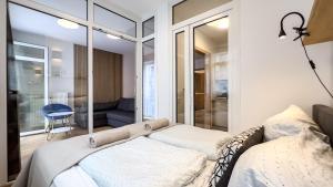 Ένα ή περισσότερα κρεβάτια σε δωμάτιο στο Sunshine City Apartment - Leipzig Zentrum - Kostenfreier Tiefgaragenstellplatz +28 φωτογραφίες