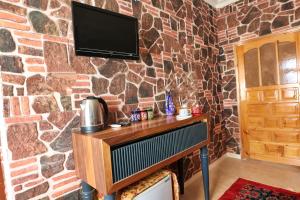 TV a/nebo společenská místnost v ubytování Cappadocia Hostel