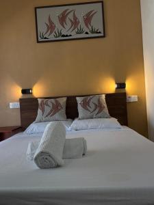 Кровать или кровати в номере Lu3ky's Den