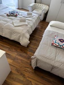 Postel nebo postele na pokoji v ubytování Albergo la Svolta