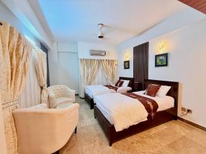 Voodi või voodid majutusasutuse Spacious 3 BHK Condo Central, Cozy & Convenient toas