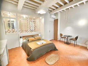 Postel nebo postele na pokoji v ubytování Le Mignet by Rentalaix