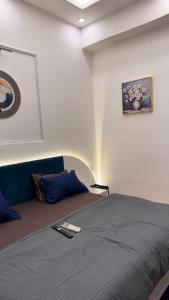 Ένα ή περισσότερα κρεβάτια σε δωμάτιο στο Visitor Stop