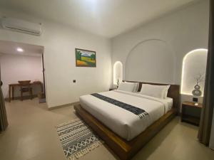Una cama o camas en una habitación de Sagunalam Tetebatu 2 fotos más