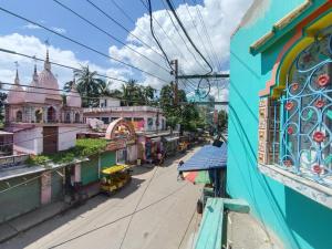 an overhead view of a city street with buildings at Mayapur Yatri Nivas in mayapur